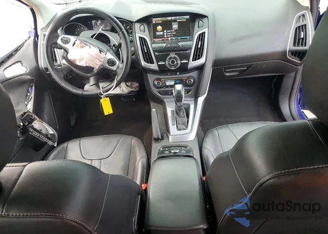 2014 Ford Focus Titanium z USA, uszkodzony, nr VIN 1FADP3N20EL231890